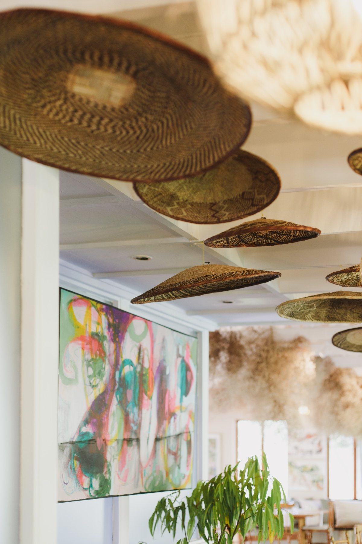 Woven baskets, pendant lights and artwork inside Melfort
